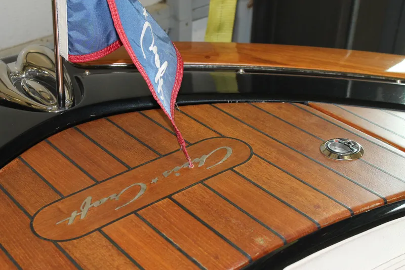 Slide: The Image of 2018 Chris-Craft Launch 34 teak deck with branded flag detail. - 46