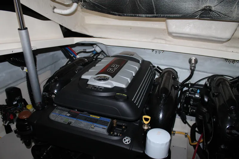 Slide: The Image of Engine compartment of a 2018 Chris-Craft Launch 34 boat, featuring a 6.2L engine. - 49