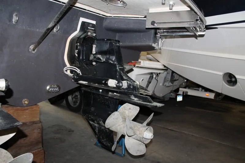 Slide: The Image of 2018 Chris-Craft Launch 34 boat propeller and stern drive in a garage setting. - 57