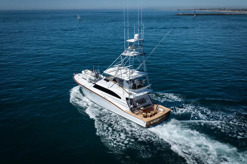 Slide: The Image of Luxurious 1993 Lydia Sportfisher yacht interior with scenic ocean view and comfortable seating. - 14