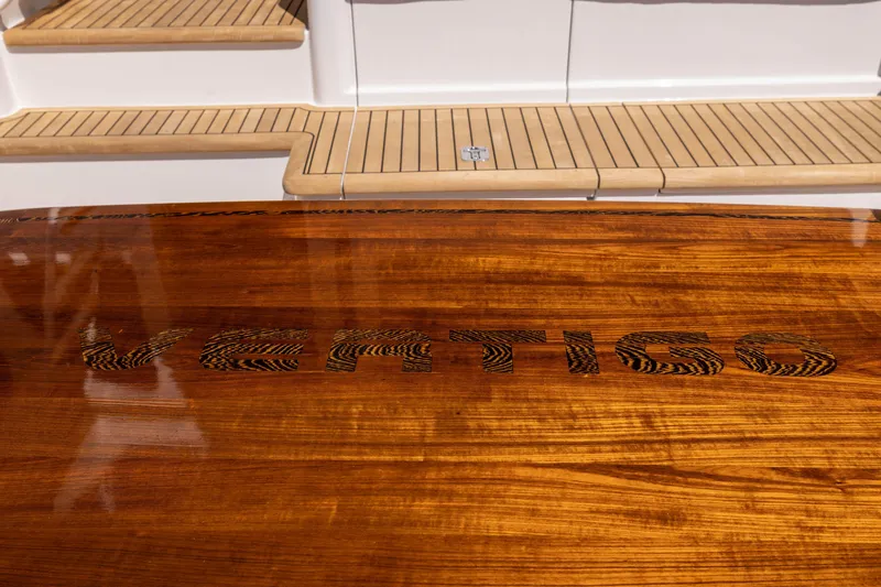 Slide: The Image of Luxurious 1993 Lydia Sportfisher yacht interior with leather seating and elegant wood cabinetry. - 21