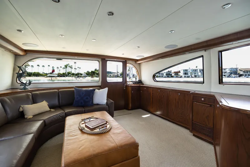Slide: The Image of Luxurious cabin interior of a 1993 Lydia Sportfisher yacht with elegant wood finish. - 32