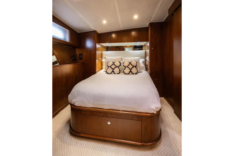 Slide: The Image of Stacked washer and dryer in a 1993 Lydia Sportfisher yacht's wooden interior. - 39