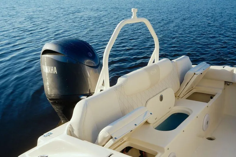 Slide: The Image of 2026 Key West 219 FS boat with Yamaha engine on calm water. - 6