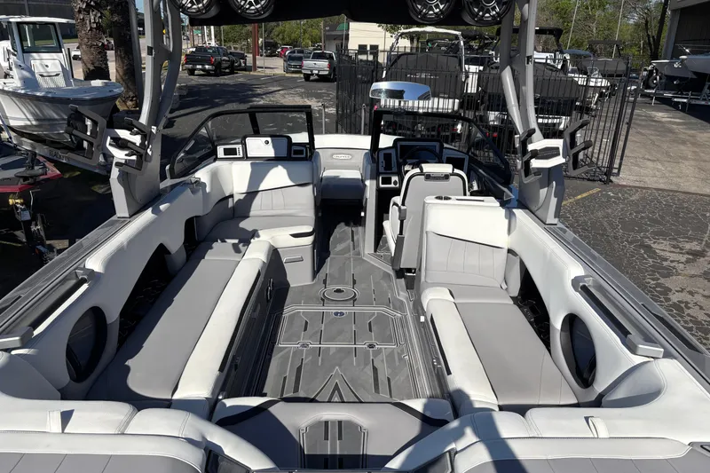 Slide: The Image of 2021 Supra SE 550 boat interior with spacious seating and modern design. - 10