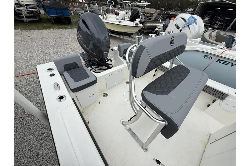 Slide: The Image of 2026 May-Craft 182 boat interior with Yamaha engine and cushioned seating. - 5