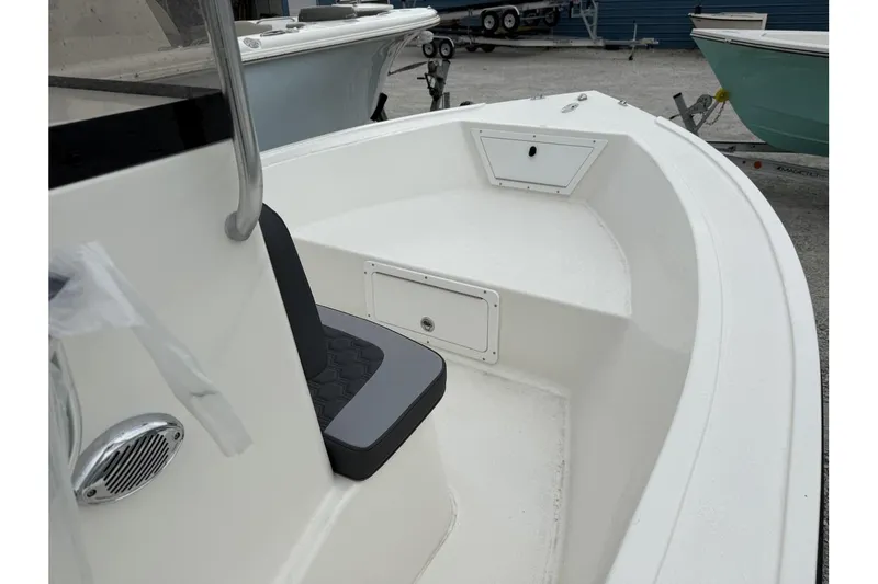 Slide: The Image of 2026 May-Craft 182 boat interior with seating and storage compartments. - 6