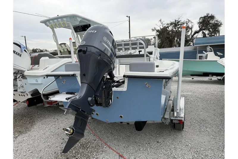 Slide: The Image of 2026 May-Craft 182 boat with Yamaha 90 outboard motor on trailer. - 8