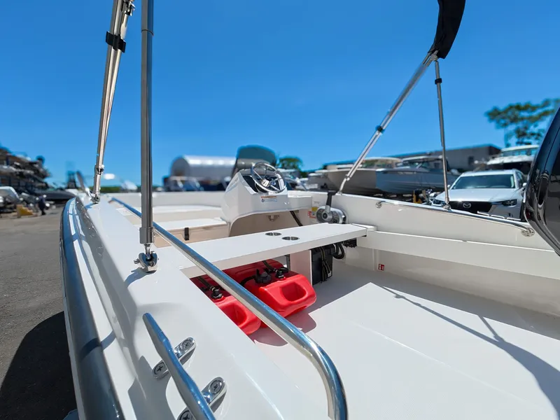 Slide: The Image of Boston Whaler 160 Super Sport 2026 on a parking lot. - 10
