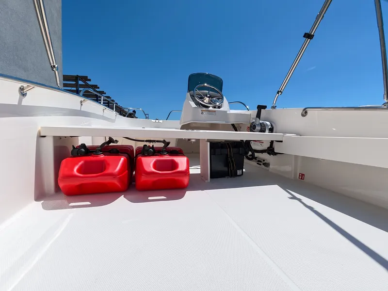 Slide: The Image of Boston Whaler 160 Super Sport 2026 with red fuel tanks. - 11