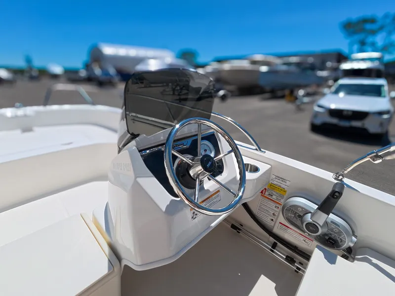 Slide: The Image of Helm of the 2026 Boston Whaler 160 Super Sport. - 13
