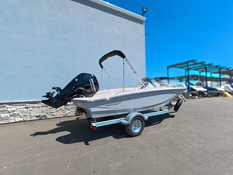 Slide: The Image of Boston Whaler 160 Super Sport 2026 on water with passengers. - 23