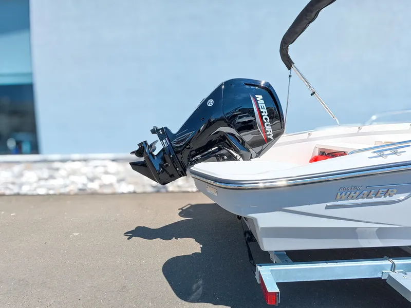 Slide: The Image of Boston Whaler 160 Super Sport 2026 with Mercury engine on water. - 27