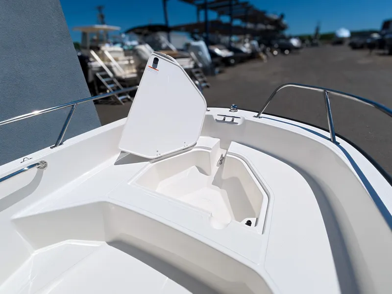 Slide: The Image of Boston Whaler 160 Super Sport 2026 on open water under blue sky. - 29