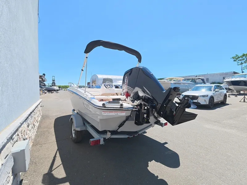 Slide: The Image of Boston Whaler 160 Super Sport 2026 on trailer outdoors. - 3