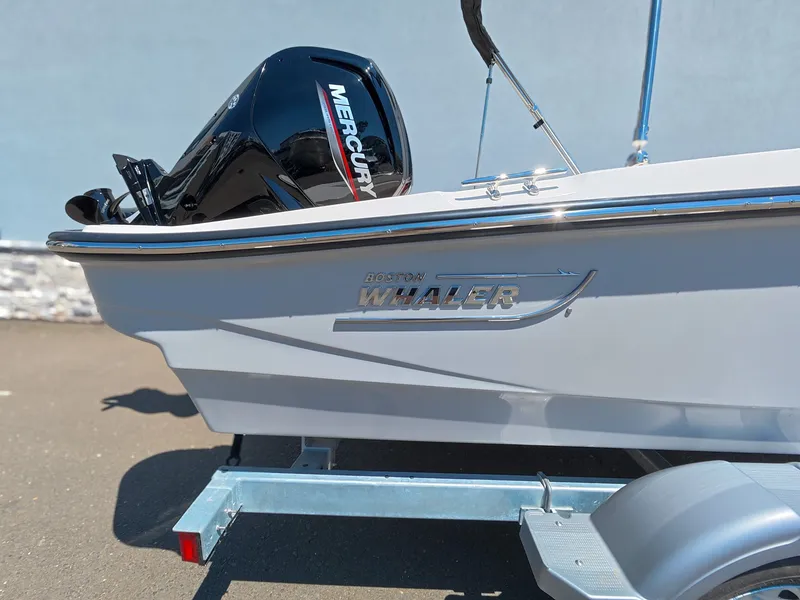 Slide: The Image of Boston Whaler 160 Super Sport 2026 with Mercury engine on trailer. - 8