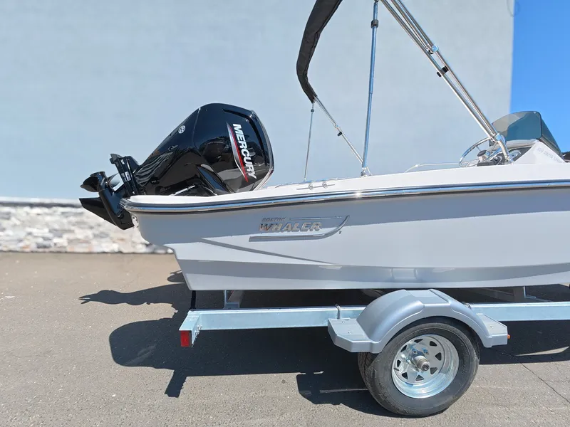 Slide: The Image of Boston Whaler 160 Super Sport 2026 on trailer with Mercury engine. - 9