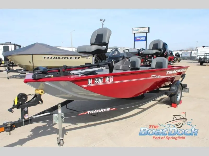 Slide: The Image of Red Tracker Pro 170 boat, 2022 model, on trailer outdoors. - 4