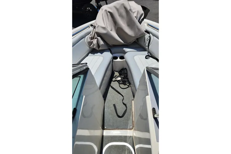 Slide: The Image of Interior view of a 2000 MasterCraft Prostar 205 boat with seating and storage. - 9