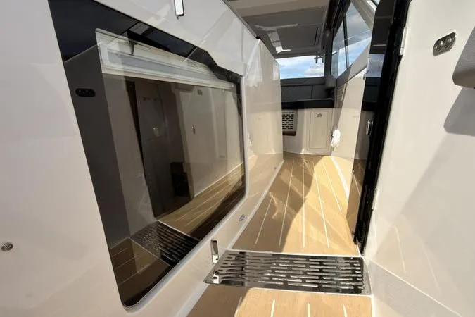 Slide: The Image of 2025 Regal LX43 yacht interior with sleek design and modern finishes. - 66