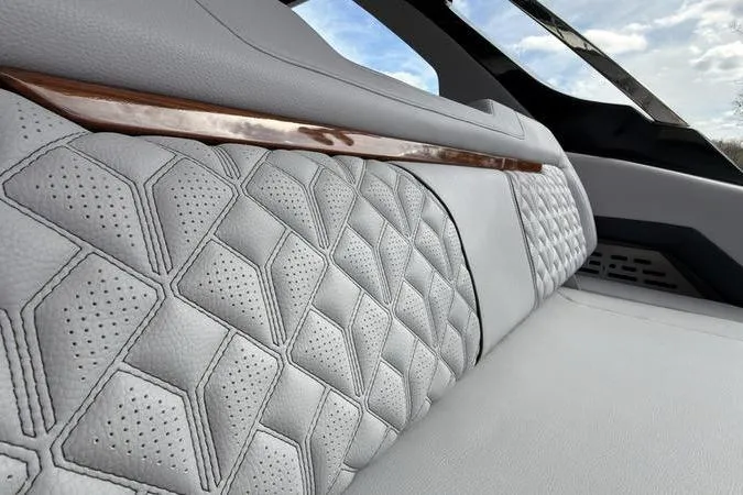 Slide: The Image of Luxurious interior of 2025 Regal LX43 with quilted leather and wood accents. - 89