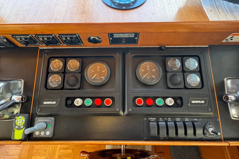 Slide: The Image of Control panel of a 1987 Lien Hwa 47 Cockpit Motoryacht with gauges and switches. - 16