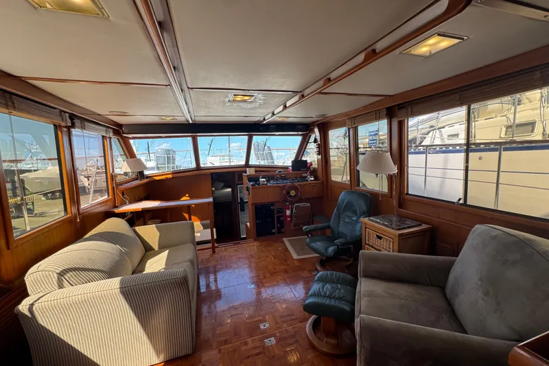 Slide: The Image of Interior of 1987 Lien Hwa 47 Cockpit Motoryacht with comfortable seating and helm station. - 18
