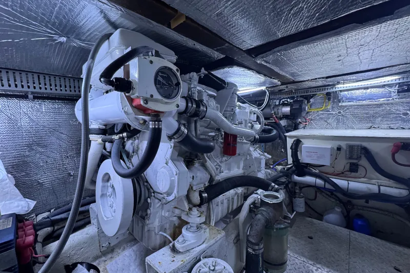 Slide: The Image of Engine room of 1987 Lien Hwa 47 Cockpit Motoryacht with visible machinery and wiring. - 30