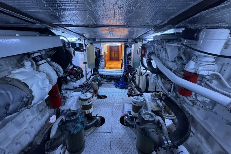 Slide: The Image of Engine room of 1987 Lien Hwa 47 Cockpit Motoryacht, showcasing mechanical components and systems. - 31