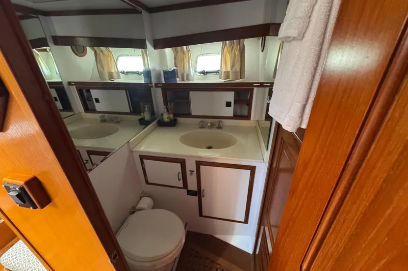 Slide: The Image of Bathroom interior of 1987 Lien Hwa 47 Cockpit Motoryacht with sink and mirror. - 5