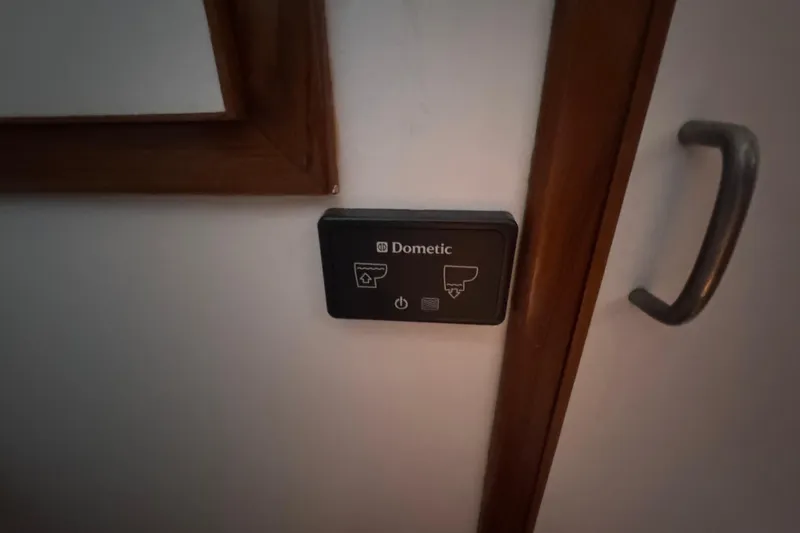 Slide: The Image of Control panel on 1987 Lien Hwa 47 Cockpit Motoryacht interior, featuring Dometic system. - 7