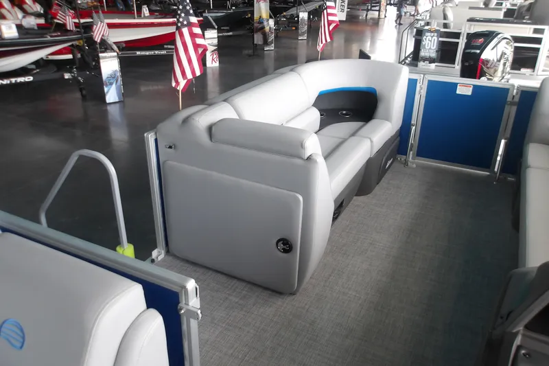 Slide: The Image of 2026 Sun Tracker Party Barge 20 DLX interior with plush seating and modern design. - 13