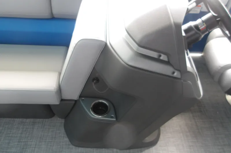 Slide: The Image of 2026 Sun Tracker Party Barge 20 DLX interior with seating and cup holder. - 18