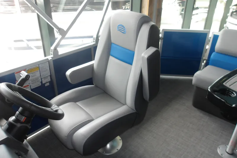Slide: The Image of Captain's chair in 2026 Sun Tracker Party Barge 20 DLX pontoon boat interior. - 19