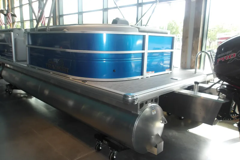 Slide: The Image of 2026 Sun Tracker Party Barge 20 DLX pontoon boat in showroom display. - 6