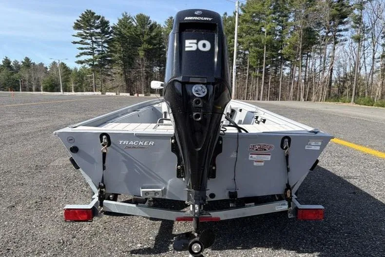 Slide: The Image of 2026 Tracker Bass Tracker Classic CC boat with Mercury 50 engine on a trailer. - 8
