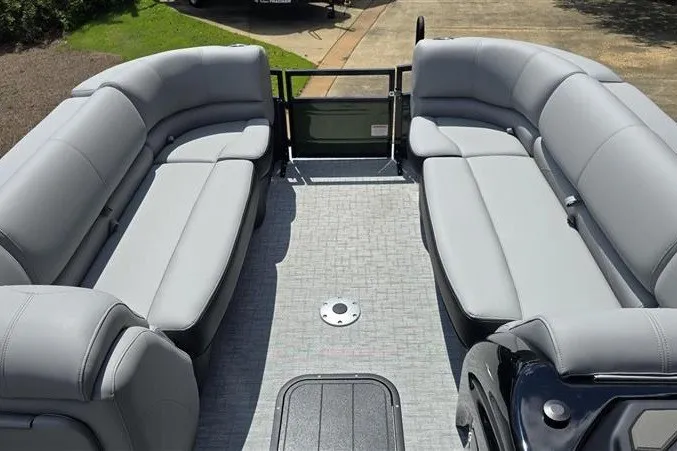 Slide: The Image of 2026 Regency 230 DL pontoon boat interior with spacious seating and modern design. - 15