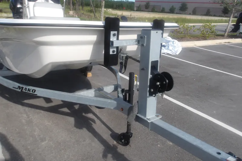 Slide: The Image of 2026 Mako Pro Skiff 13 CC on trailer in parking lot. - 4
