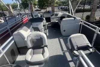 Slide: The Image of 2026 Sun Tracker Fishin' Barge 20 DLX interior with comfortable seating and fishing amenities. - 8