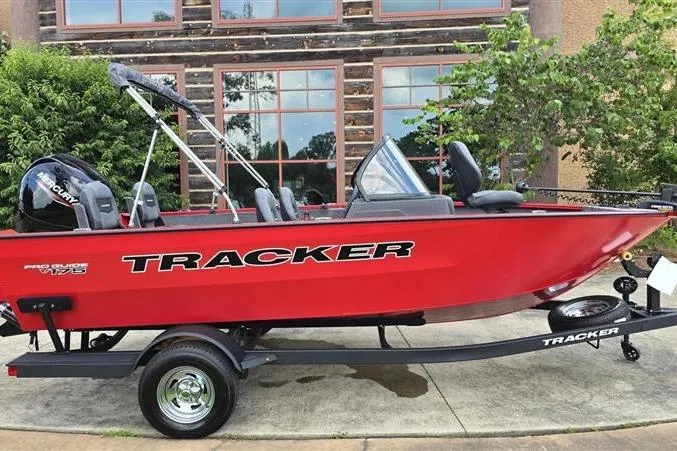 The Image of 2026 Tracker Pro Guide V-175 Combo boat in vibrant red on a trailer. - 0