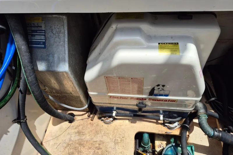 Slide: The Image of Fischer Panda generator in a 2008 Robalo R305 Walkaround boat engine compartment. - 27