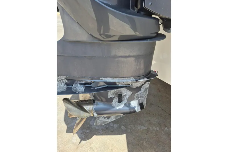 Slide: The Image of 2008 Robalo R305 Walkaround boat engine with visible wear and corrosion. - 33