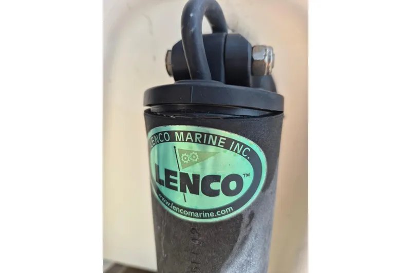 Slide: The Image of Close-up of a Lenco Marine component on a 2008 Robalo R305 Walkaround boat. - 32
