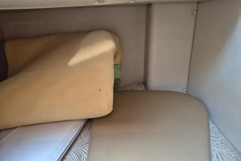 Slide: The Image of Interior cabin of 2008 Robalo R305 Walkaround with cushions and upholstery. - 16