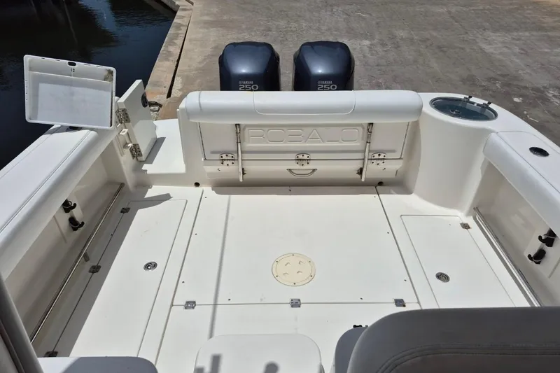 Slide: The Image of 2008 Robalo R305 Walkaround boat deck with Yamaha 250 engines, spacious and well-equipped. - 24