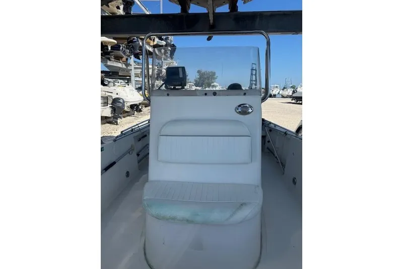 Slide: The Image of 2006 Sea Pro 196 Center Console boat interior with seating and console view. - 14