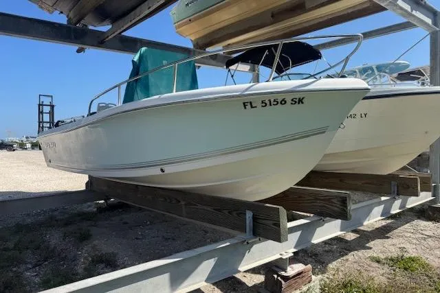 Slide: The Image of 2006 Sea Pro 196 Center Console boat on a trailer, side view. - 6