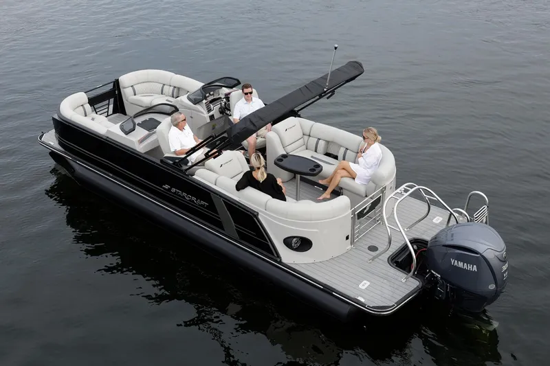 Slide: The Image of Manufacturer Provided Image: Manufacturer Provided Image: 2026 Starcraft RX 23 DL pontoon boat with Yamaha engine on calm water. - 7