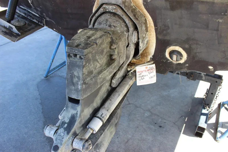 Slide: The Image of 2006 Sea Ray Sundancer 260 boat outdrive, winterized, on a stand. - 41