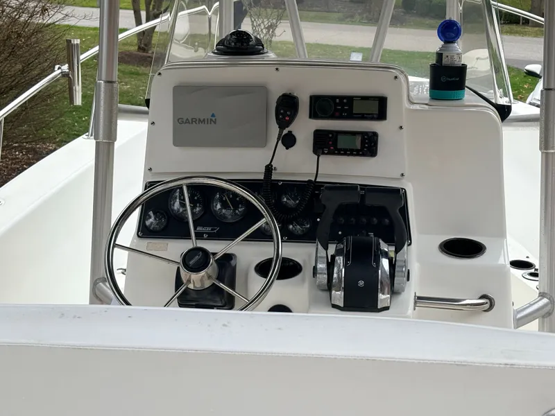 Slide: The Image of Helm console of a 1999 Boston Whaler 230 Outrage boat. - 9